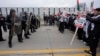 صدر بائیڈن کے وارن ، مشی گن کے دورے کے دوران فلسطینیوں کے امی مظاہرین نے پولیس کے خلاف ایک مارچ کی ، فوٹو اے پی یکم فروری 2024