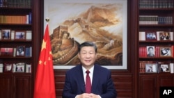 Chủ tịch Trung Quốc Tập Cận Bình đọc thông điệp năm mới tại Bắc Kinh. Ảnh do Tân Hoa Xã đăng tải ngày 31/12/2023.