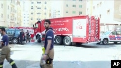 امدادی کارکن جائے حادثہ پر۔ کویت ٹی وی