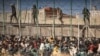 مراکش سے سپین جانے والے تارکین وطن کو روکنے کے لئے میلیا کی سرحد بند کر دی گئی
اے پی فوٹو ۔ 