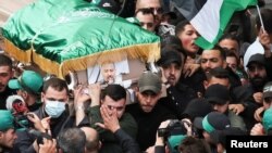 بیروت میں صالح العاروی کے جنازے کا جلوس۔ فوٹو رائٹرز