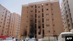 12 جون 2024 کو کویت میں آگ کا شکار ہونے والی
رہائشی عمارت۔
