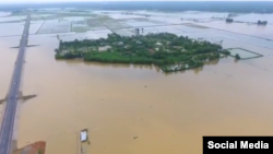 Ảnh chụp từ video trên YouTube của tác giả Bùi Minh Tuấn cho thấy cảnh tượng ngập lụt tại miền Trung Việt Nam.