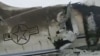 طارق غزنی وال کی فراہم کردہ اس تصویر میں امریکی فوج کا وہ طیارہ دیکھا جا سکتا ہے جو صوبہ غزنی کے شمالی علاقے میں پیر کے روز گر کر تباہ ہوا۔ امریکہ نے اپنے ایک فوجی نگران طیارے کے گرنے کی تصدیق کر دی ہے۔ 27 جنوری 2020