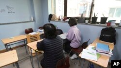 Tư liệu- Choe, sinh viên 20 tuổi, có mẹ là người tị nạn người Bắc Triều Tiên và cha là người Trung Quốc ngồi trong một cuộc phỏng vấn tại Trường Tình yêu Nam Bắc ở Seoul, Hàn Quốc.